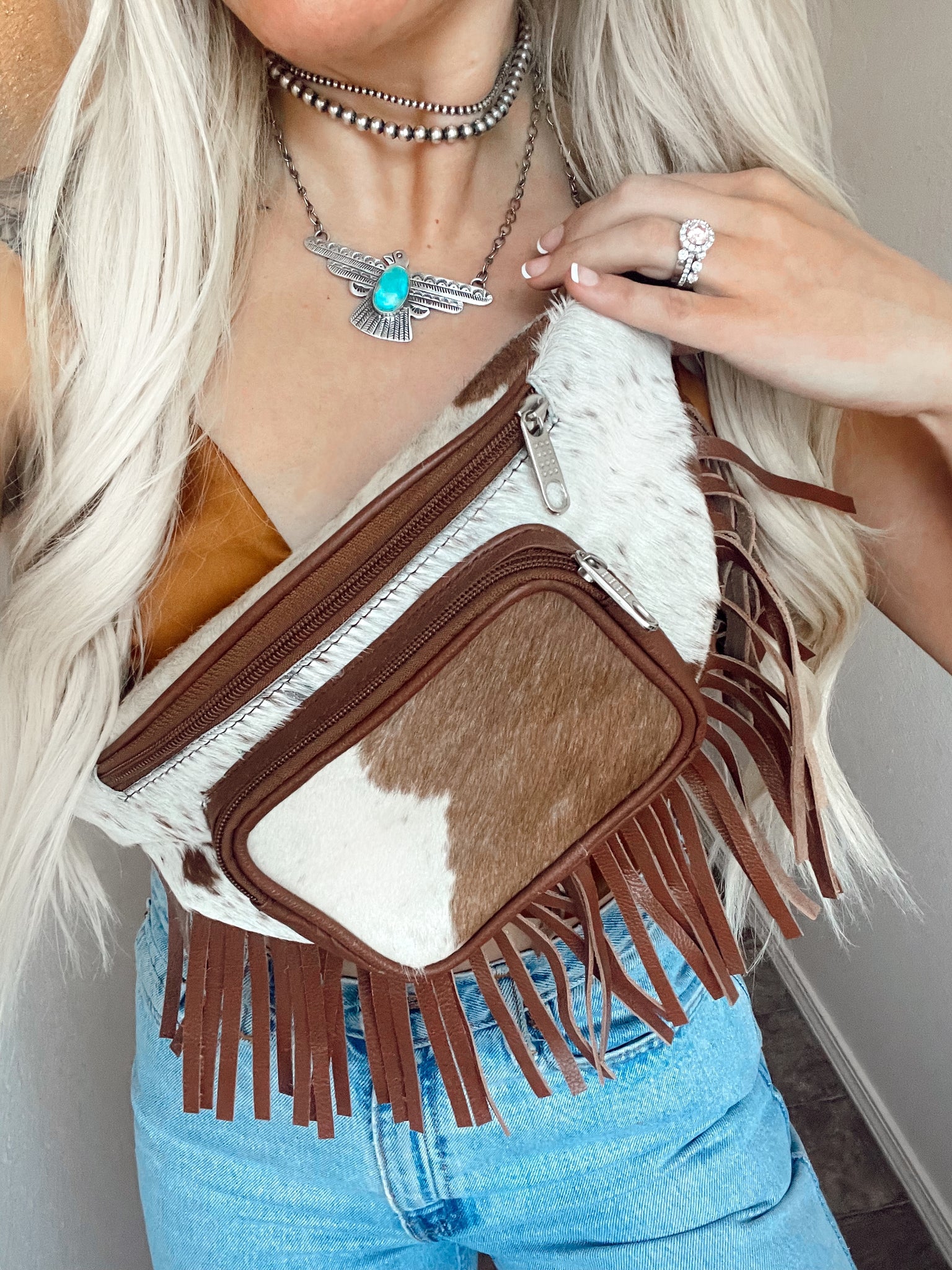 A buckskin purse for my 3 year old niece, to hold the rocks she likes to  collect. : r/Leathercraft